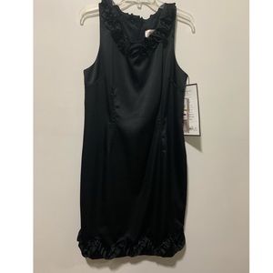 Black cocktail dress with flower accents